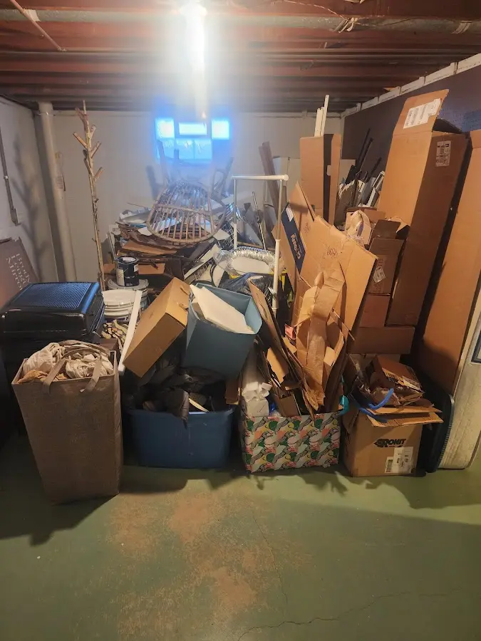 Roll-off dumpster container at job site for 15 Yard Dumpster Rental in Crawford